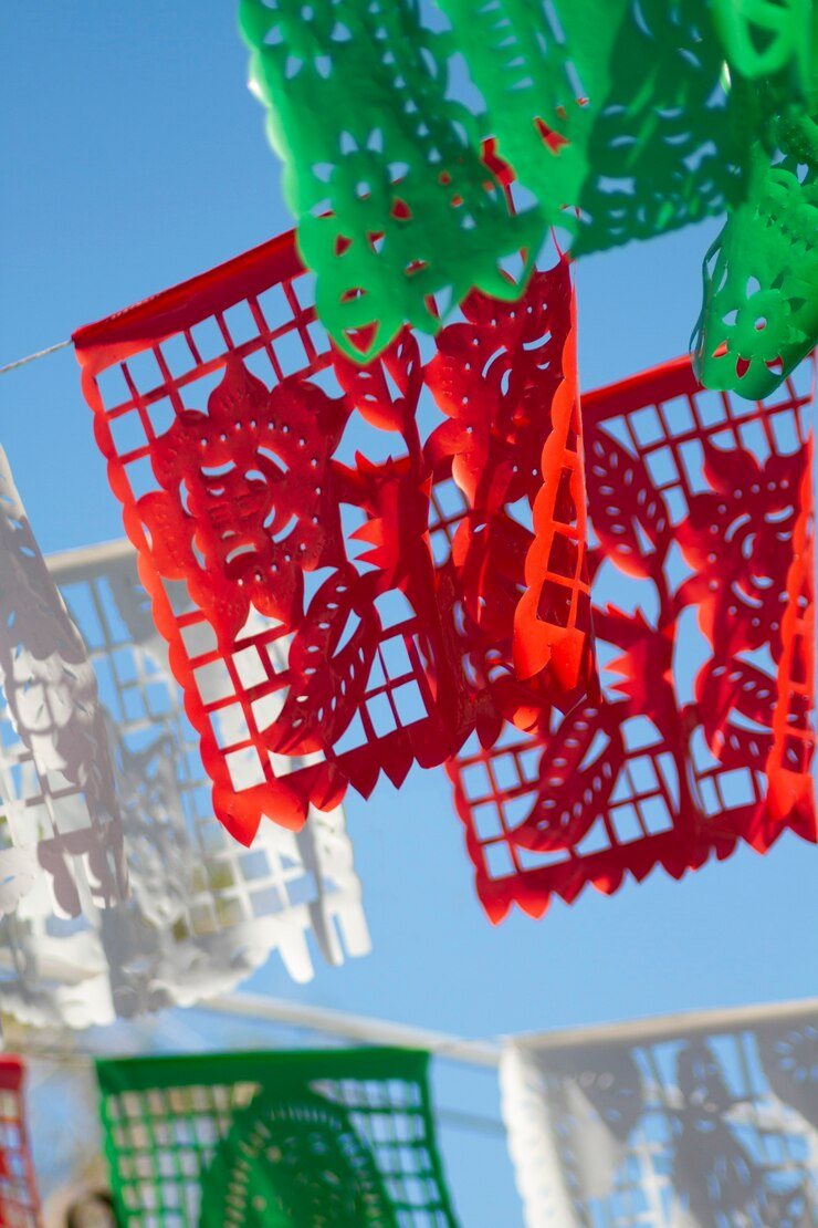 Colorful papel picado decorations at a celebration