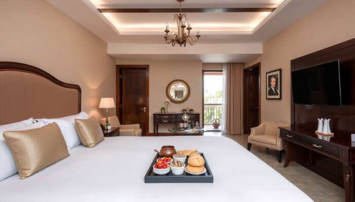 Luxurious hotel suite in San Miguel de Allende with spotlessly clean rooms, elegant amenities, and a gourmet breakfast display.